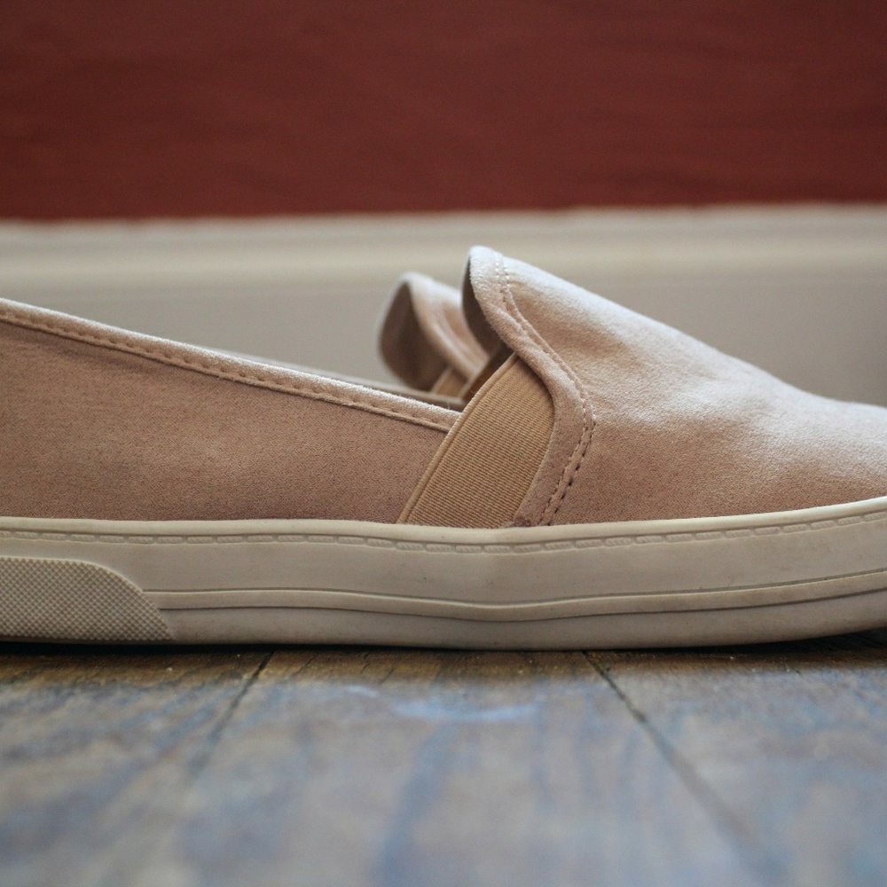 Pale pink slip on sneakers